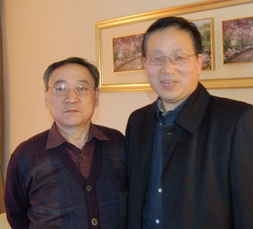 秘书长孙京伟与国务院参事徐锭明在一起